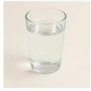 A glass of water for English drink vocabulary learners.
