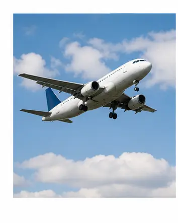 An aeroplane flying in the sky for English transport vocabulary learners.