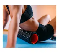 Foam roller woman using a foam roller