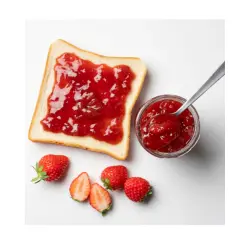 Spreading jam on toast