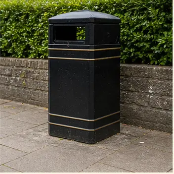 A realistic vocabulary image showing a litter bin on a pavement.
